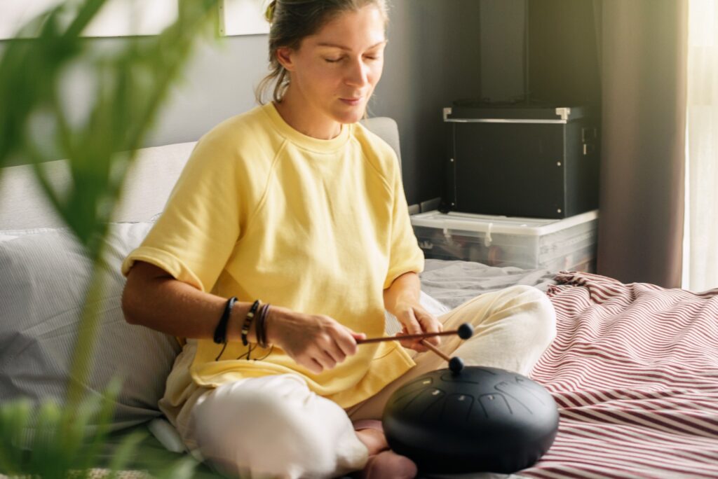 Mental health mindfullness wellbeing and balance concept. Sounds therapy. Women health. Tank drum